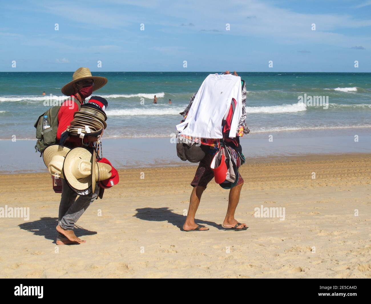 Natal, Rio Grande do Norte, Brazil - January 18, 2021: street vendor works offering his various products on the sand of Ponta Negra beach in Natal, Ri Stock Photo
