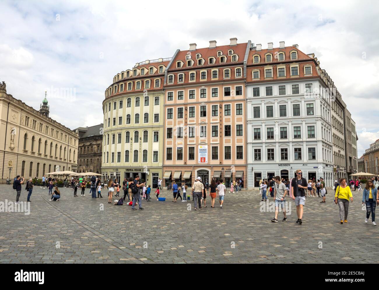 Tourist walk on the Dresden Frauenkirche square in Dresden. Built in the 18th century, was destroyed in the firebombing of Dresden during World War II Stock Photo