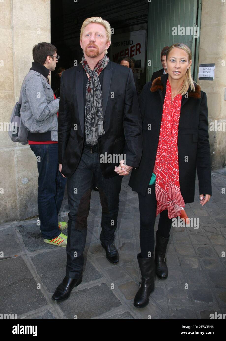 Boris Becker and his girlfriend model Sandy Meyer Woelden attending the  Talbot Runhof Spring Summer 2009