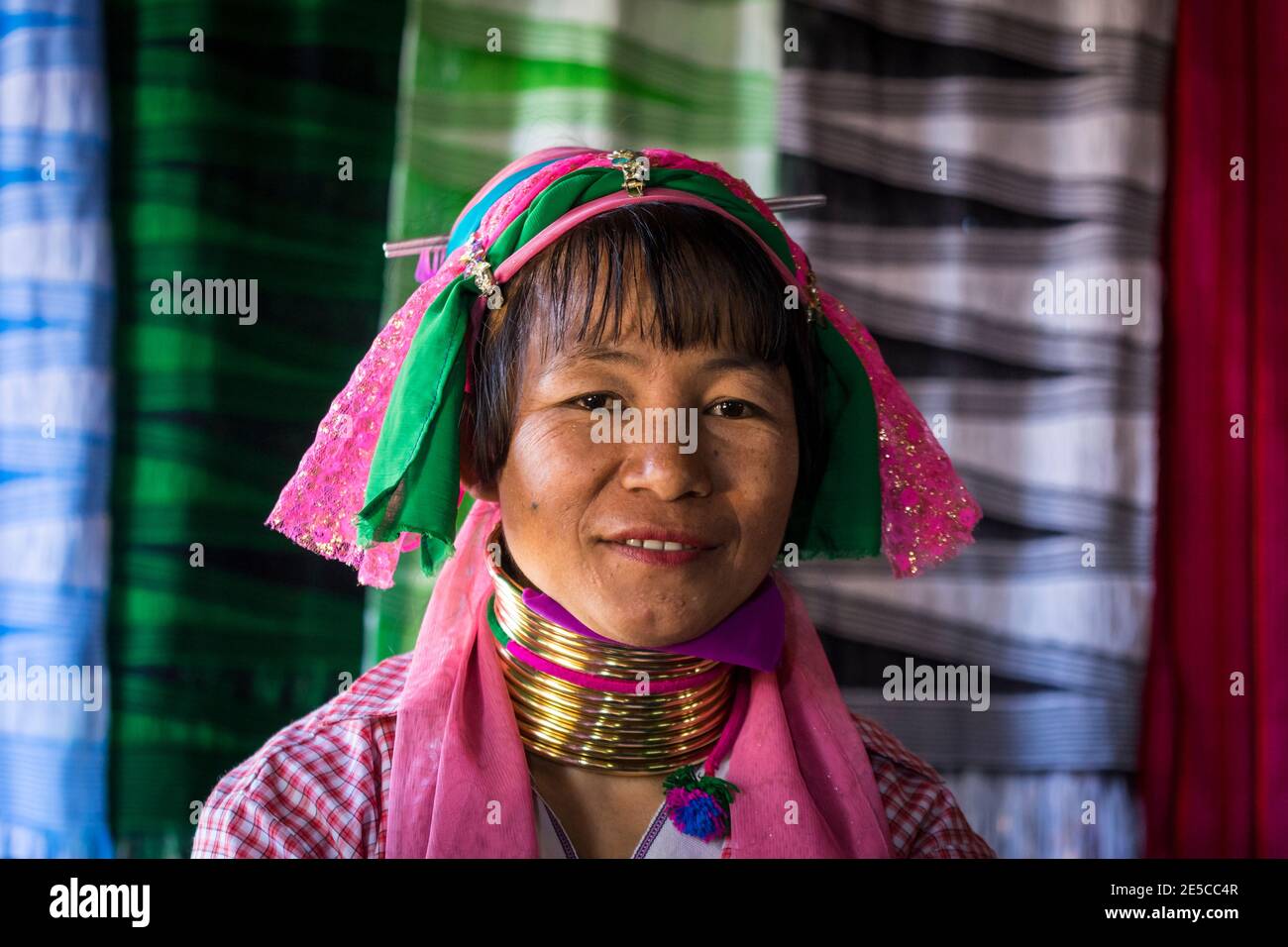 Portrait of Burmese woman from Kayan tribe at textile workshop, Stock Photo
