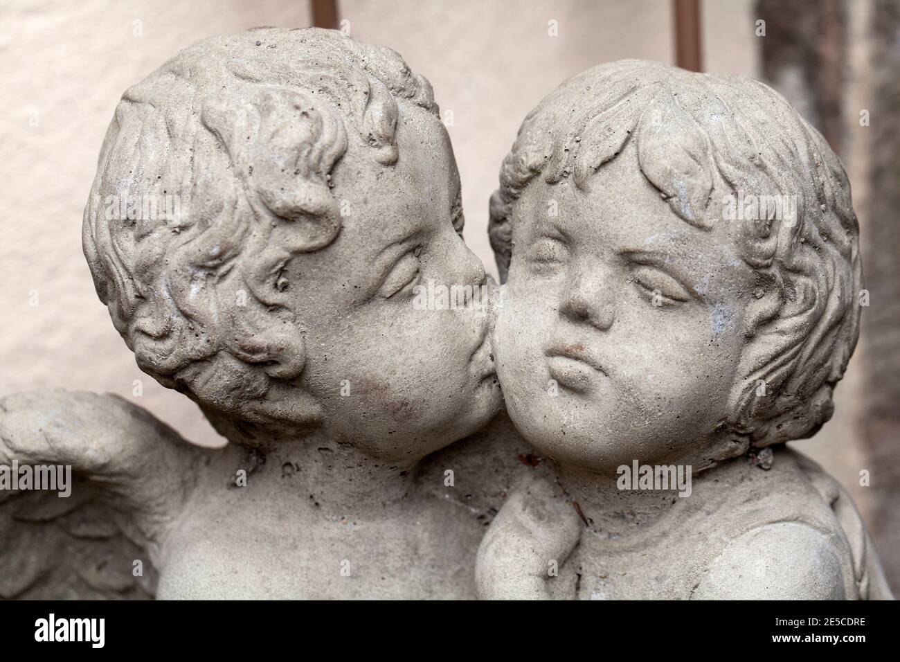 Figurine of two angels kissing Stock Photo Alamy