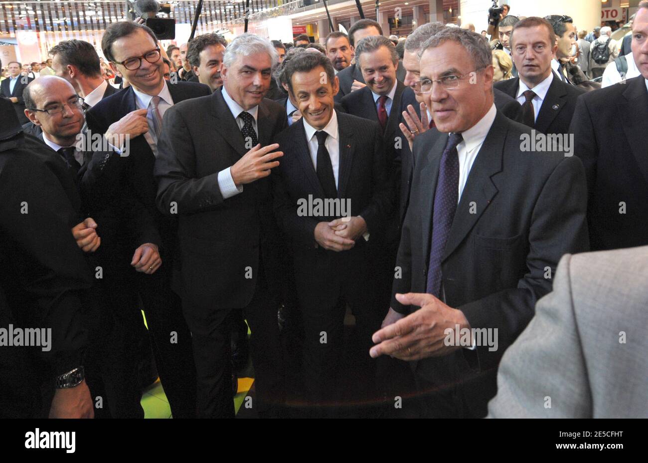 Nicolas Sarkozy, Jean-Philippe Collin and former Renault CEO Louis Schweitzer visit the Paris International Motor Show, in Paris, France, on October 9, 2008. Photo by Giancarlo Gorassini/ABACAPRESS.COM Stock Photo