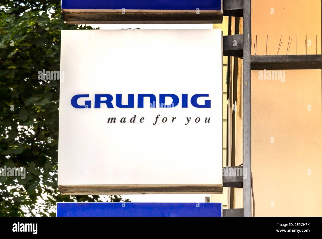 Nurnberg, Germany : Grundig logo on a pole. Grundig is a German manufacturer of consumer electronics, domestic appliances and personal care products Stock Photo