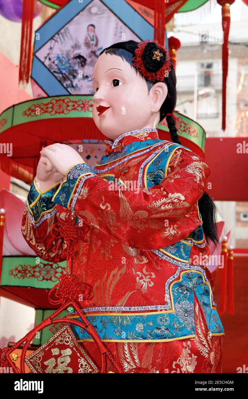 Chinese New Year doll in disguise in Paris 2008 Stock Photo