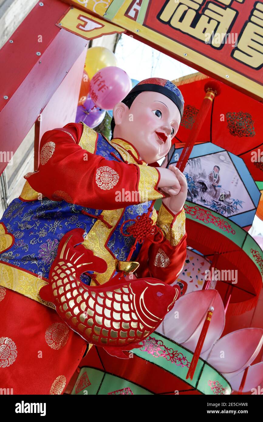 Chinese New Year doll in disguise in Paris 2008 Stock Photo