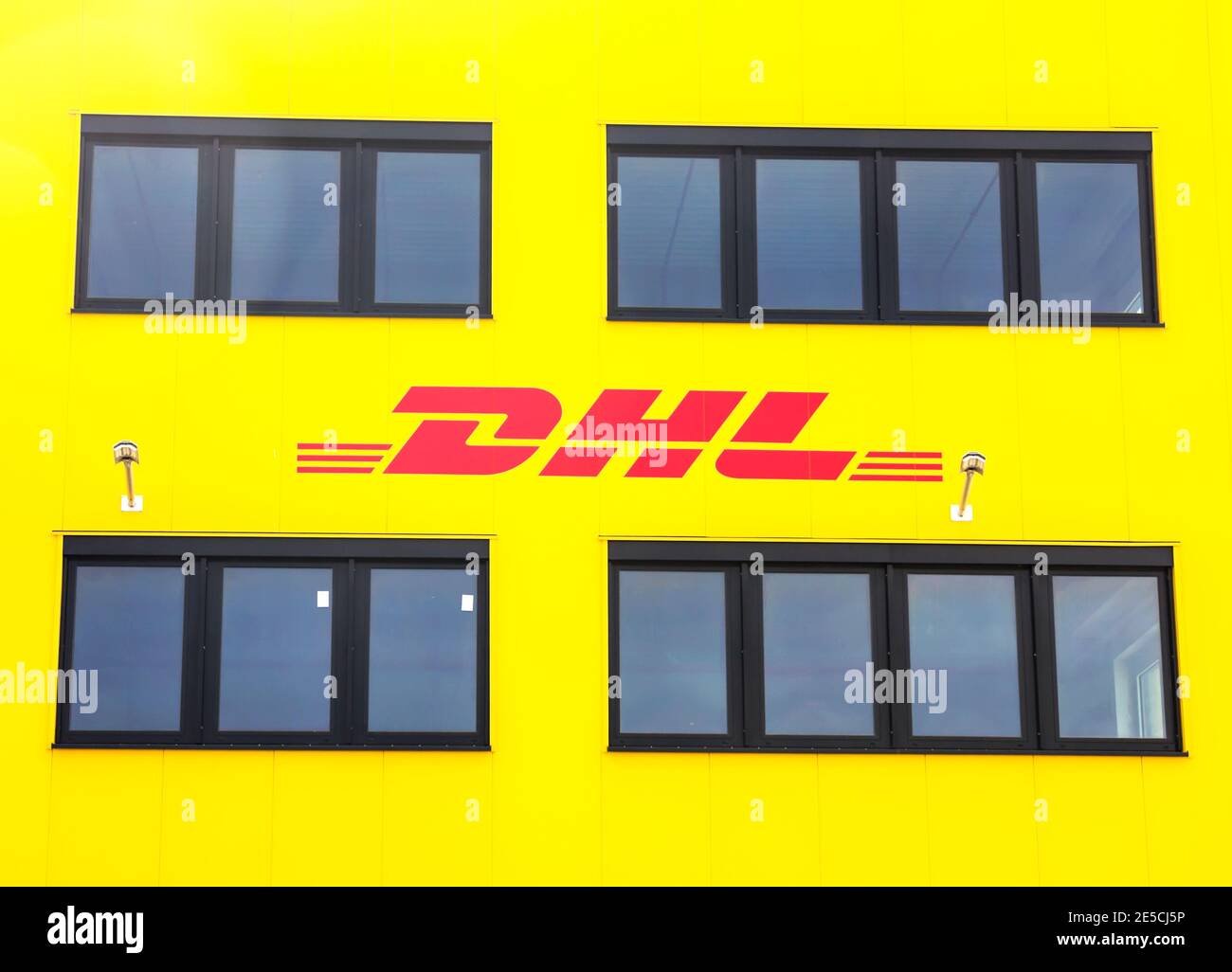 Furth, Germany : DEUTSCHE POST cargo terminal and logo on the building .Deutsche Post AG is a German courier company and the world's largest. Stock Photo