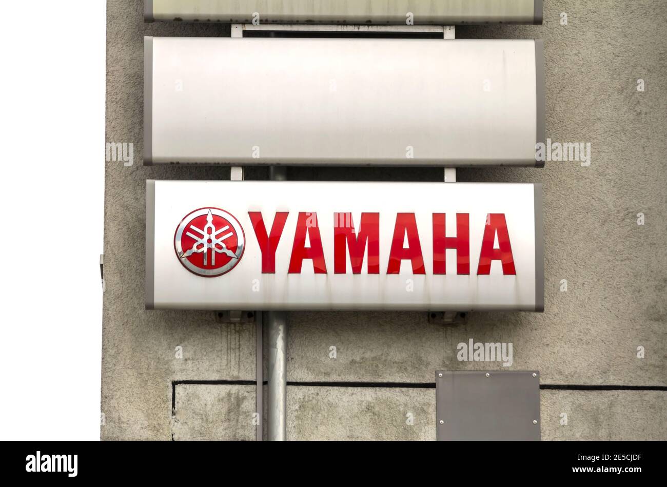 Yamaha dealership. Yamaha Corporation is a Japanese multinational