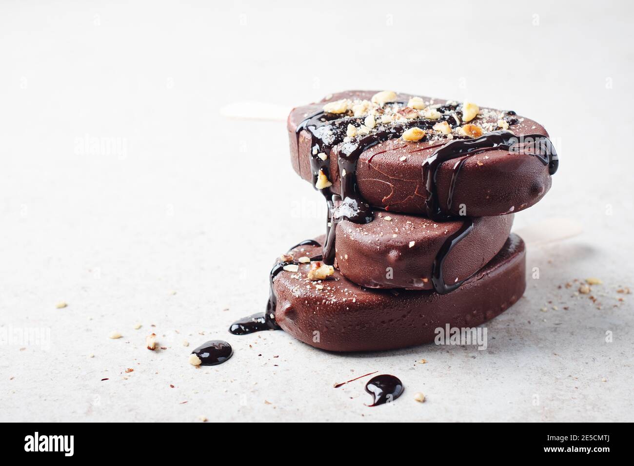 Chocolate ice cream bars with nuts. Dessert. Stock Photo