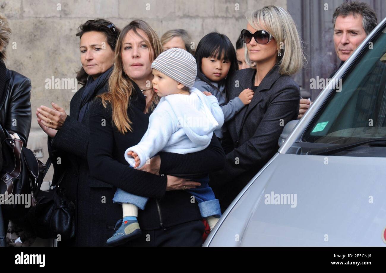 Laeticia Hallyday With Daughter Jade And Mathilde Seigner With Son Louis Attend The Funeral Of Francoise Seigner Actrice And Comedie Francaise Member At Saint Jacques Du Haut Pas Church In Paris France On