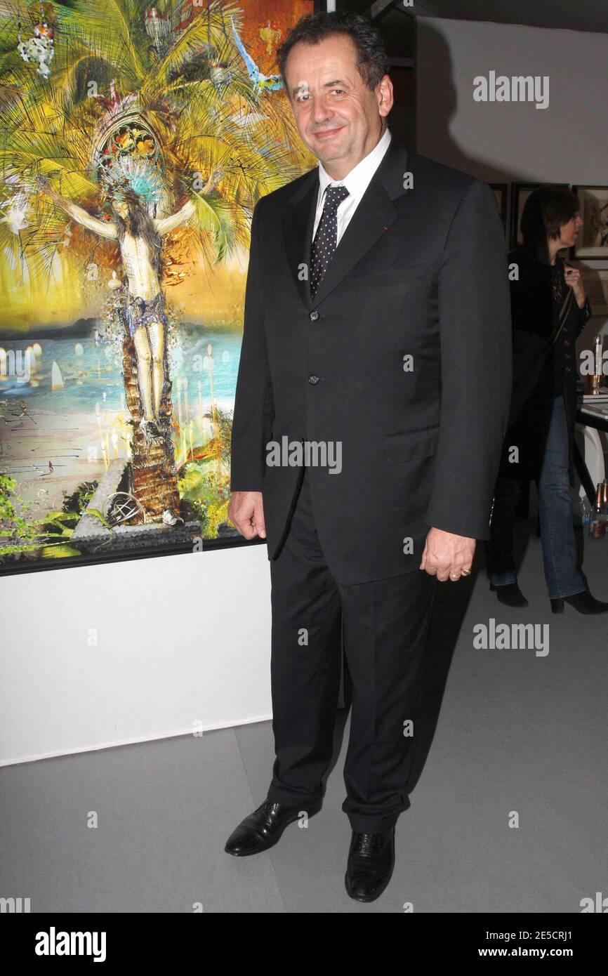 Guillaume Sarkozy poses in front of his father's painting (Pal Sarkozy) during the 'ArtElysees' exhibition during the FIAC 2008 on the Champs-Elysees in Paris, France on October 22, 2008. Photo by Benoit Pinguet/ABACAPRESS.COM Stock Photo
