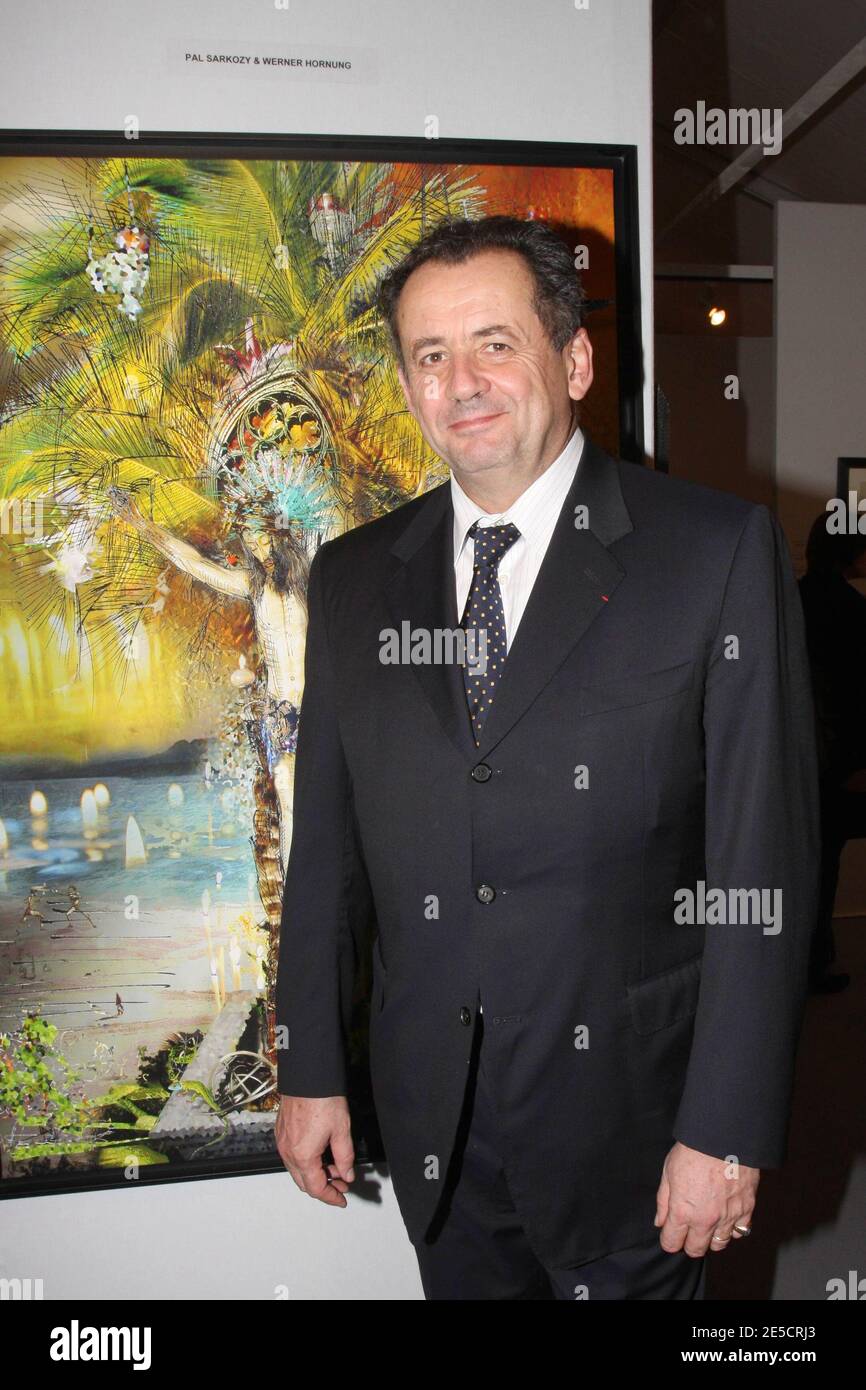 Guillaume Sarkozy poses in front of his father's painting (Pal Sarkozy) during the 'ArtElysees' exhibition during the FIAC 2008 on the Champs-Elysees in Paris, France on October 22, 2008. Photo by Benoit Pinguet/ABACAPRESS.COM Stock Photo