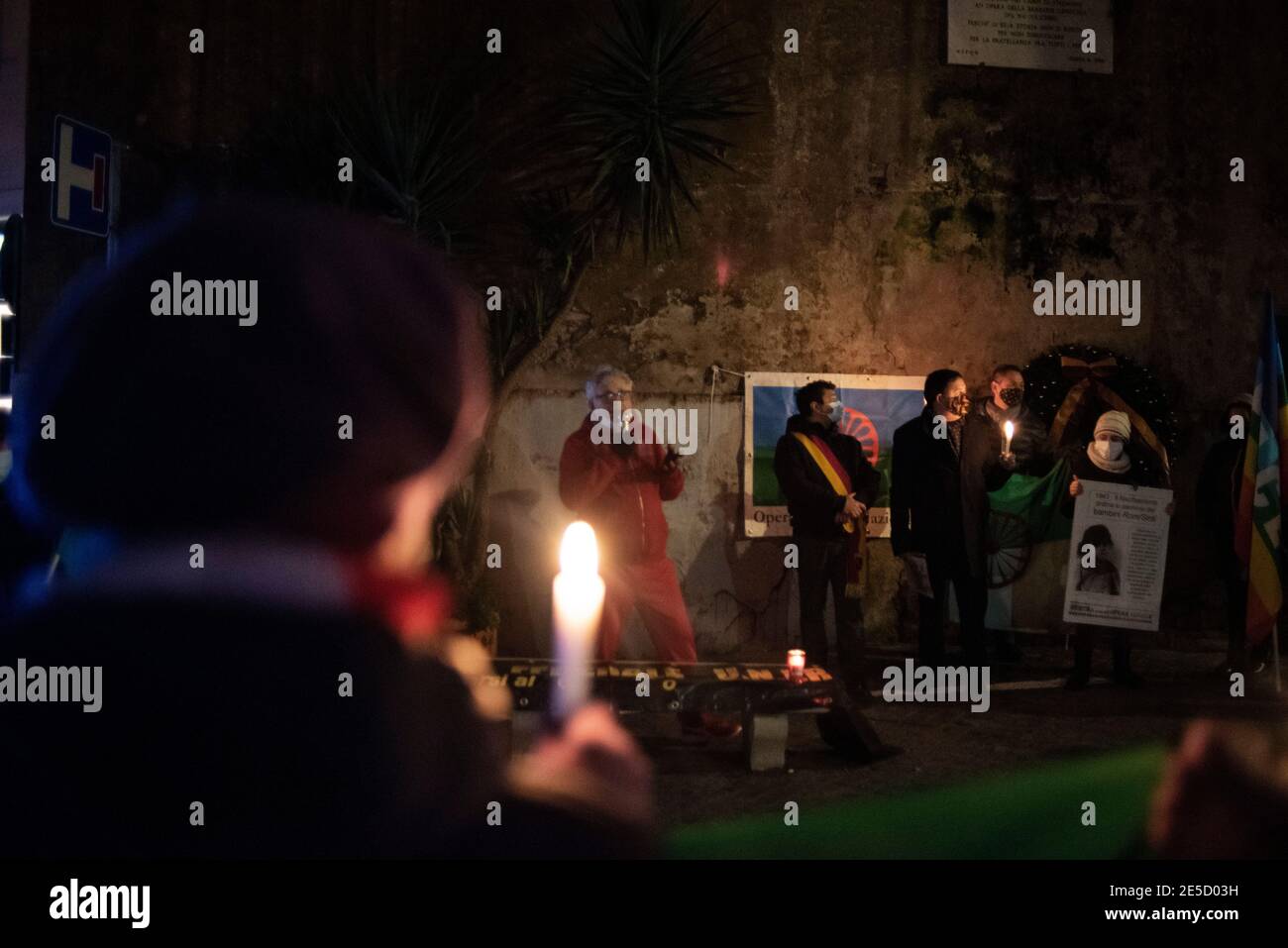 Rome, 27/01/2021. Today, a candlelit vigil was held in Rome’s Via degli Zingari to remember - as claimed by the organisers - the “forgotten victims of the Holocaust”: Roma, Sinti, Camminanti, homosexual people, disabled people, Jehovah’s Witness, political dissidents, ethnic minorities, and millions of others killed by the Nazi regime and its collaborators. The 27th of January is the International Holocaust Day, also called Holocaust Memorial Day in UK & Italy and marks the day of the liberation by the Soviet Union Army of the largest death camp, Auschwitz-Birkenau (76th Anniversary). Stock Photo