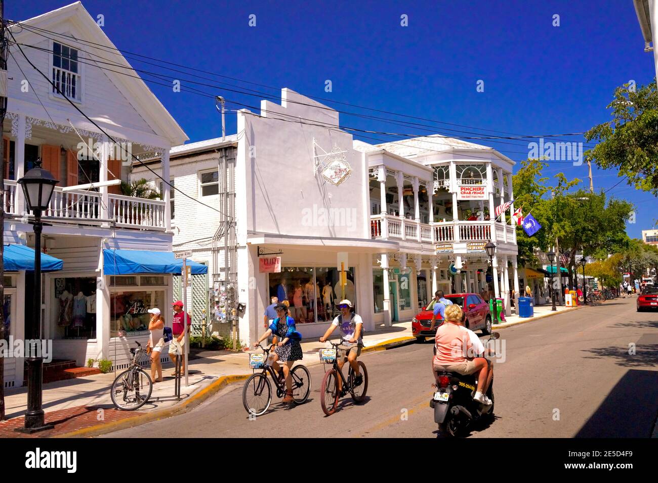 Duval Street in Key West, Florida, FL USA.  Southern most point in the continental USA.  Island vacation destination for relaxed tourism. Stock Photo
