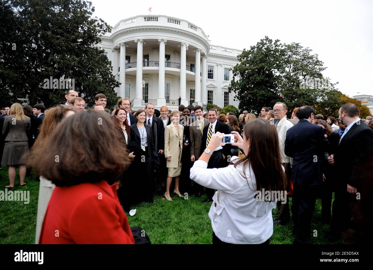 U.S. President George W. Bush 's staff take pictures on the South Lawn of the White House in Washington, DC, USA on November 6, 2008. Photo by Olivier Douliery/ABACAUSA.COM Stock Photo