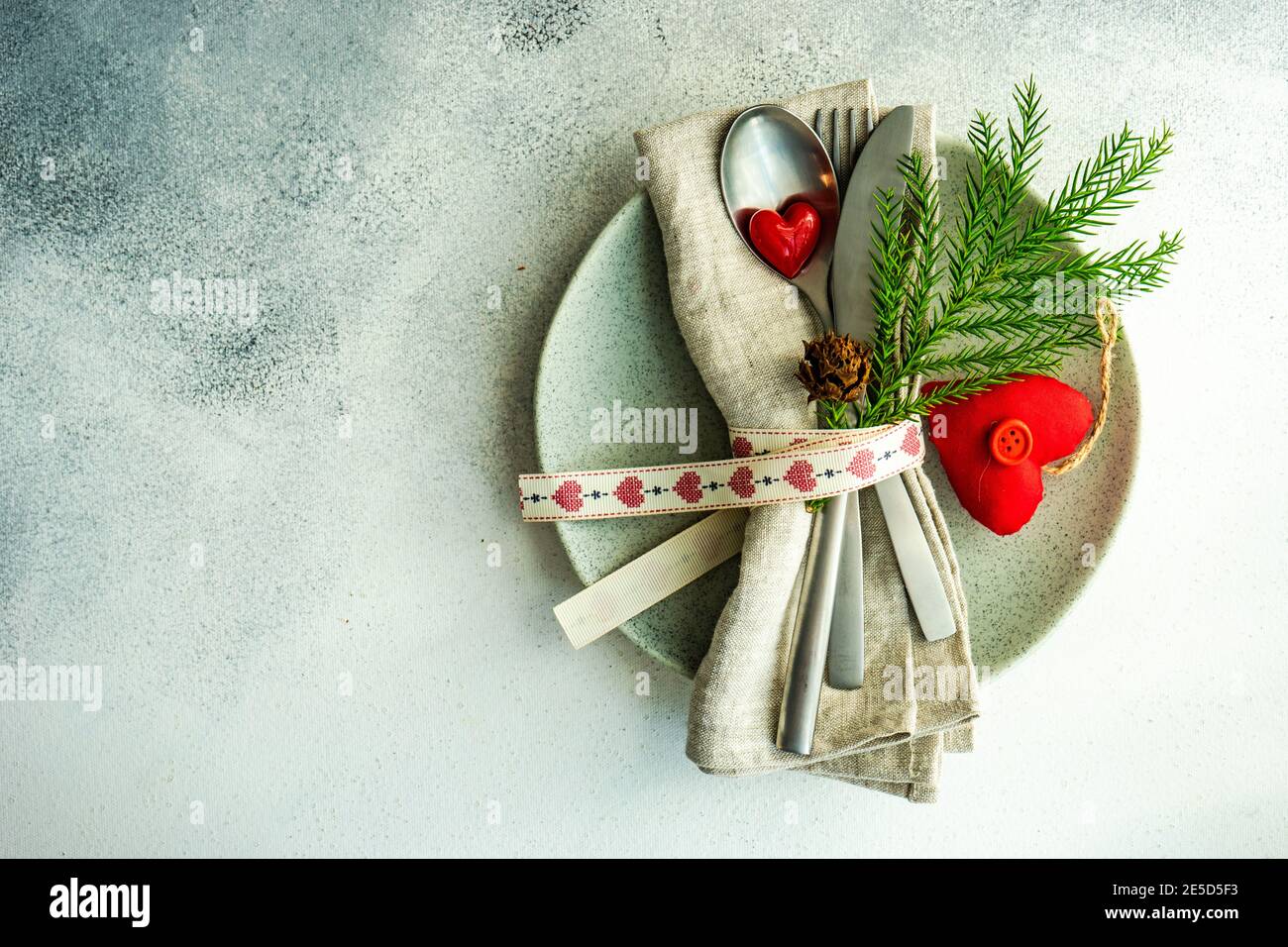 Place setting on a table for Valentine's Day Stock Photo