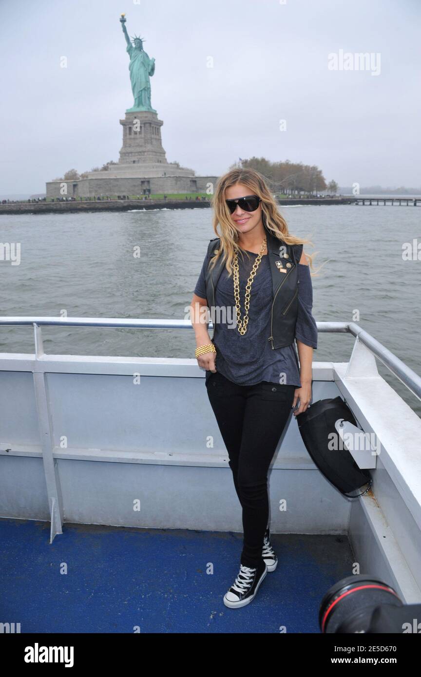 Actress Carmen Electra attends the 'Microsoft and the USO Second Annual 'A  Salute To Our Troops' US Coast Guard Tour of NY Harbor in New York City,  NY, USA on November 8,