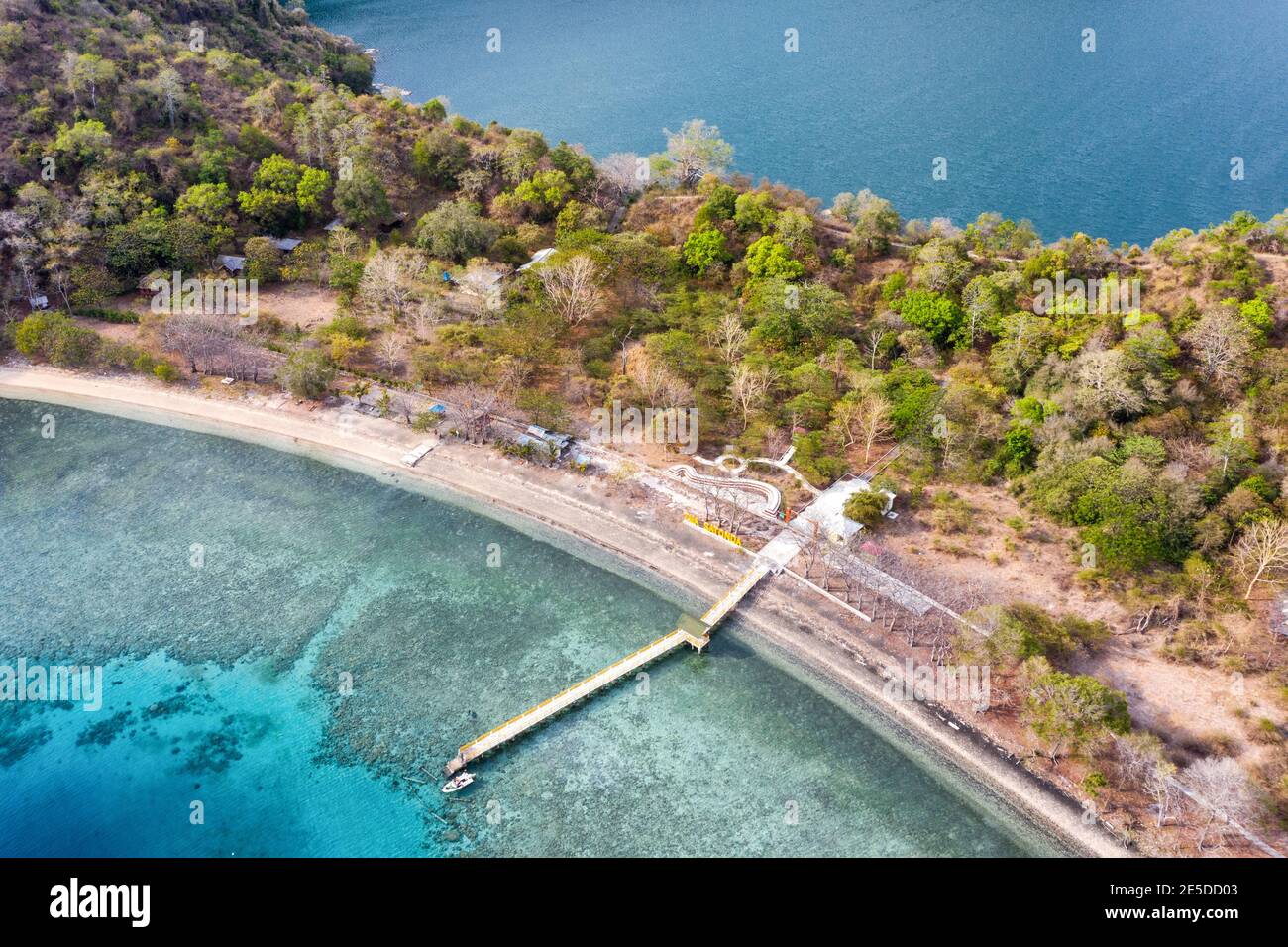 Aerial view of boat moored along a wooden jetty, Satonda island, West Nusa Tenggara, Indonesia Stock Photo