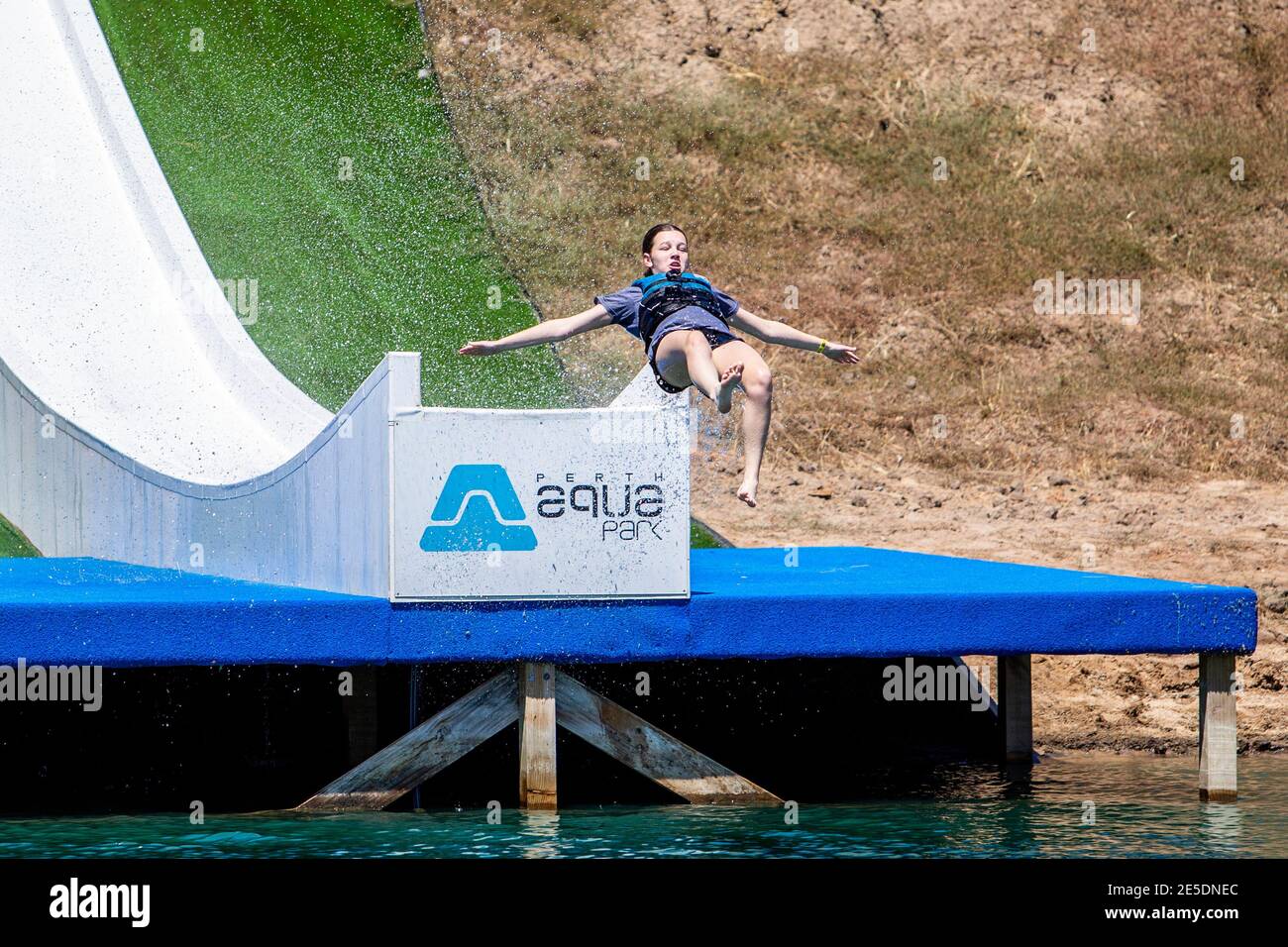 Perth, Australia January 22nd 2021 A girl in mid air at the end of a