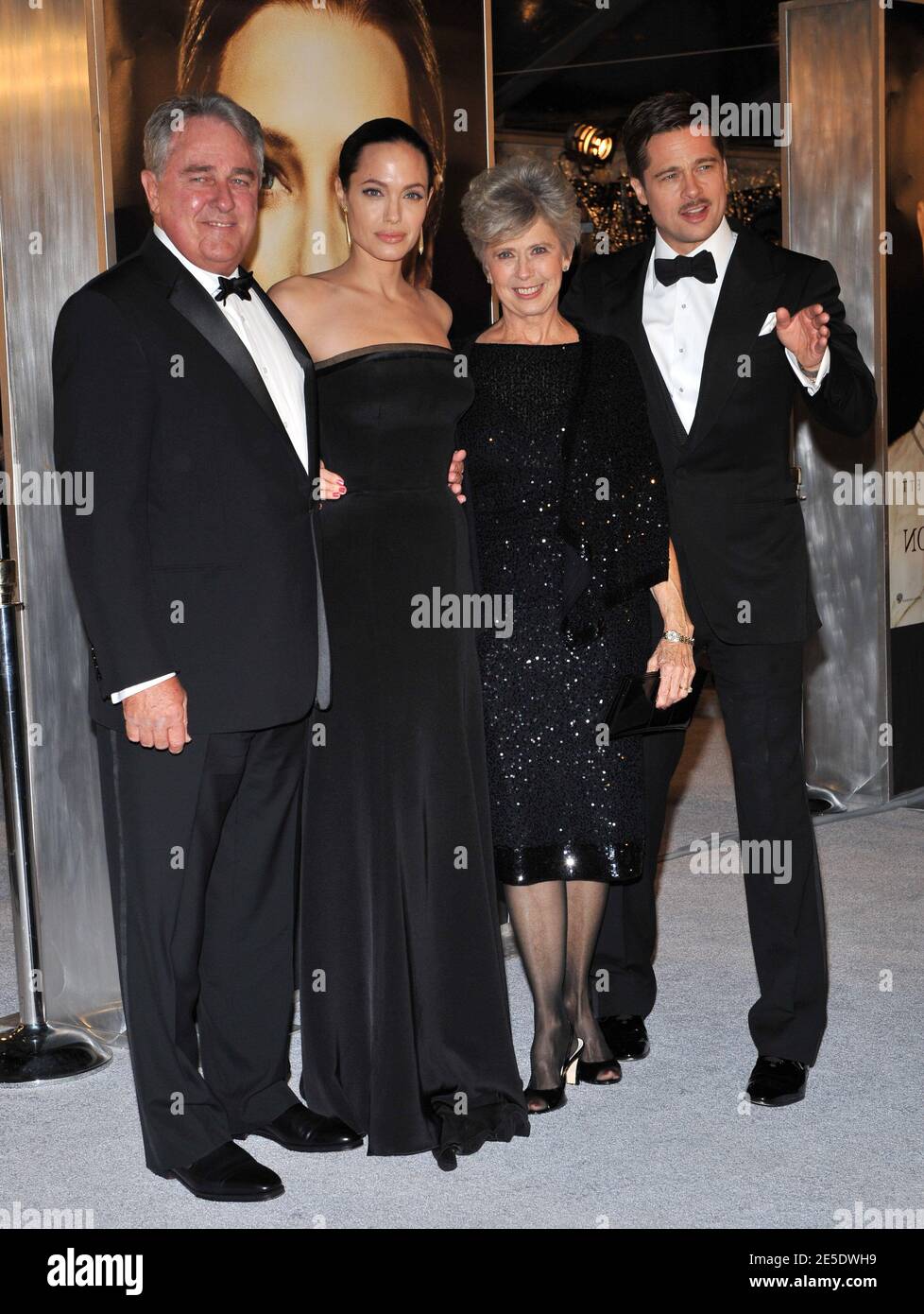 Cast member Brad Pitt and wife Angelina Jolie arriving with Brad Pitt's  parents, Bill and Jane Pitt for the premiere of 'The Curious Case Of  Benjamin Button' held at the Mann's Village