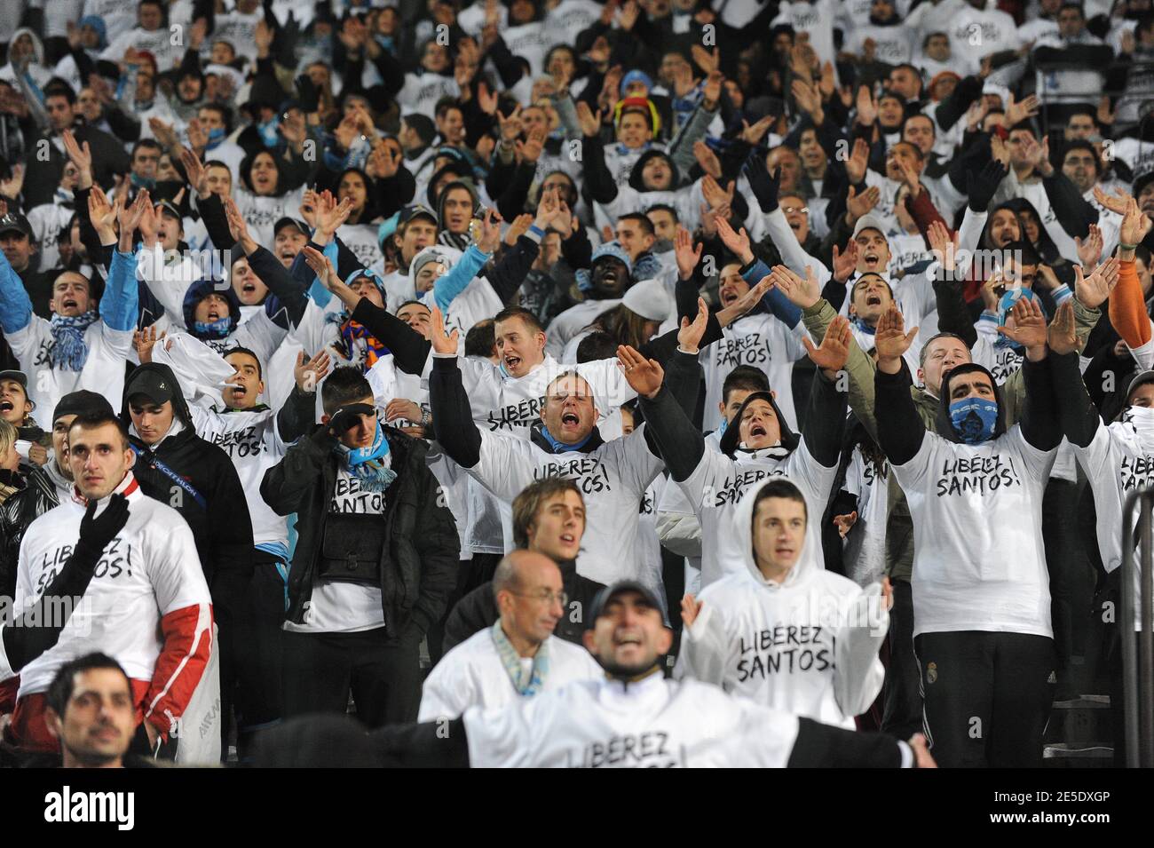 Marseille's football fans hold tee-shirt reading 'Release Santos' during  the UEFA Champions League Soccer match, Olympique de Marseille vs Athletico  Madrid at the Veledrome stadium in Marseille, France on December 09, 2008.