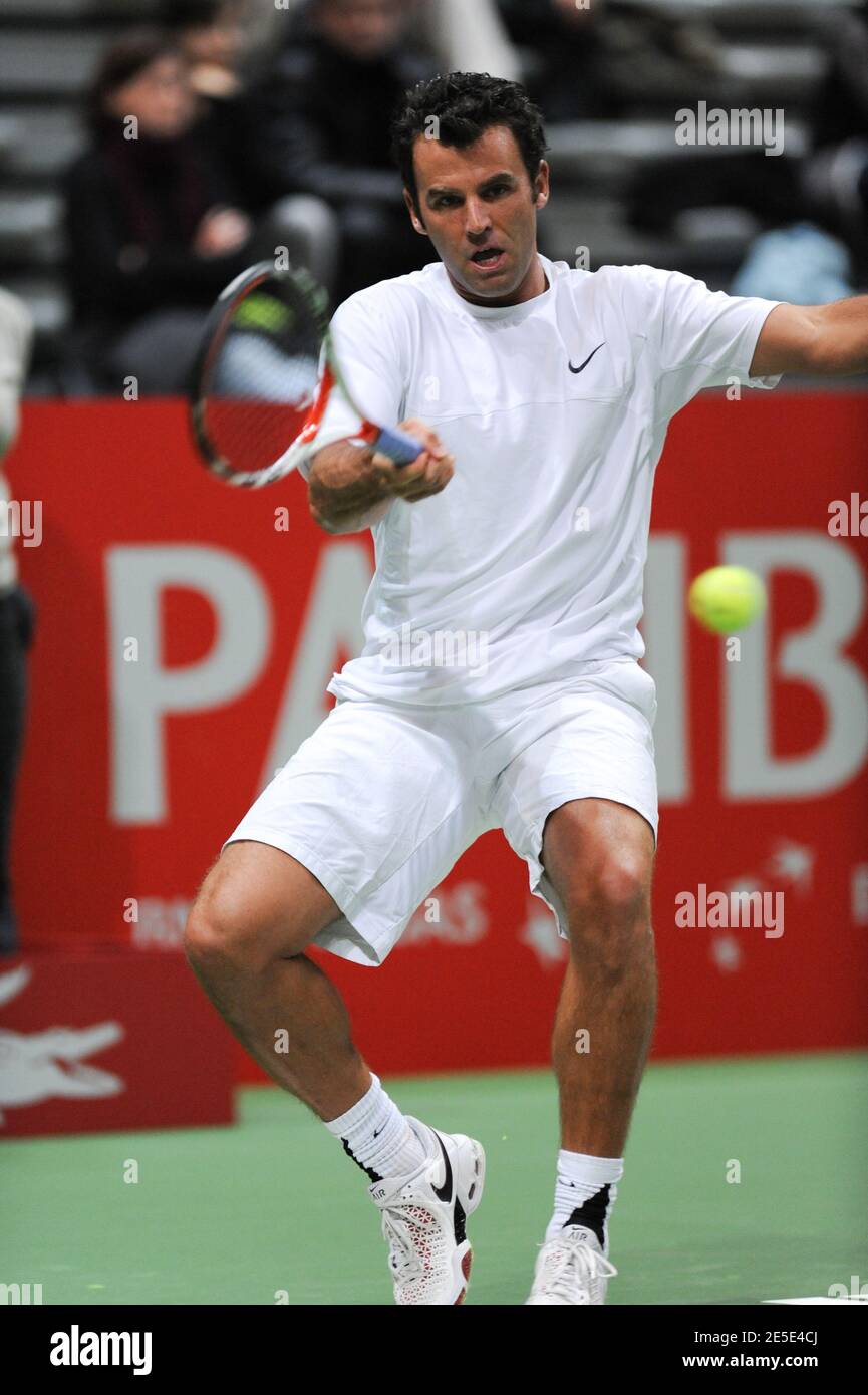 France's Marc Gicquel is defeated by his compatriot Gilles Simon defeats,  6-4 6-2, in their fist round of the French Tennis Masters in Toulouse,  France, on December 18, 2008. Photo by Fred