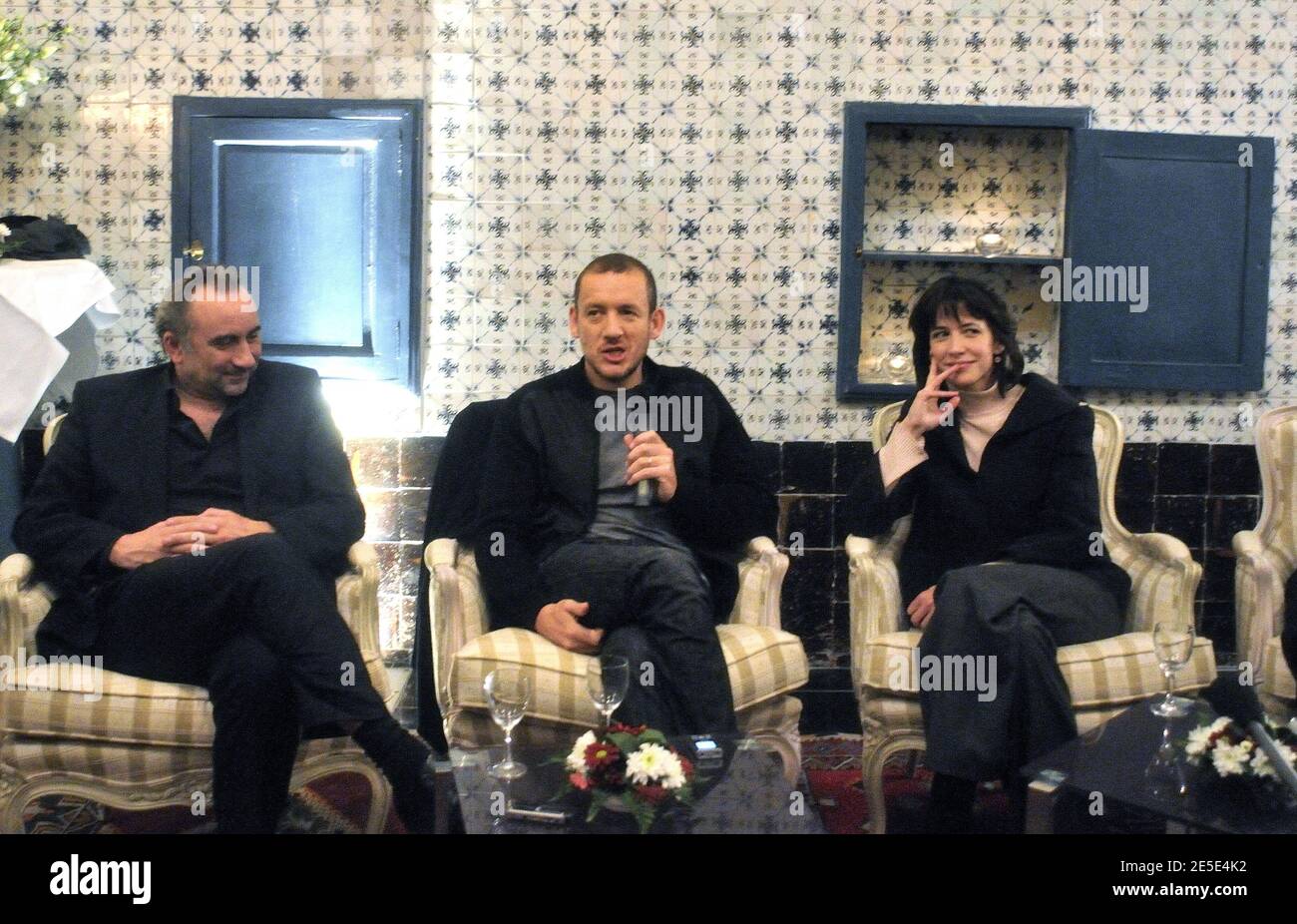 Cast members (L-R) Antoine Dulery, Dany Boon and Sophie Marceau during a press presentation of their latest film, 'De l'autre cote du lit' in LIlle, northern France on December 19, 2008. Photo by Norbert Angielczyk/ABACAPRESS.COM Stock Photo
