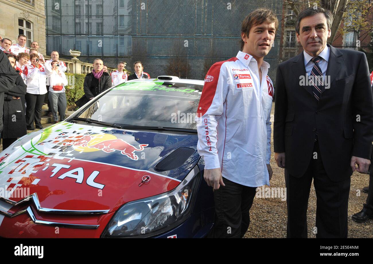 French Prime minister Francois Fillon (R), Citroen rally auto driver