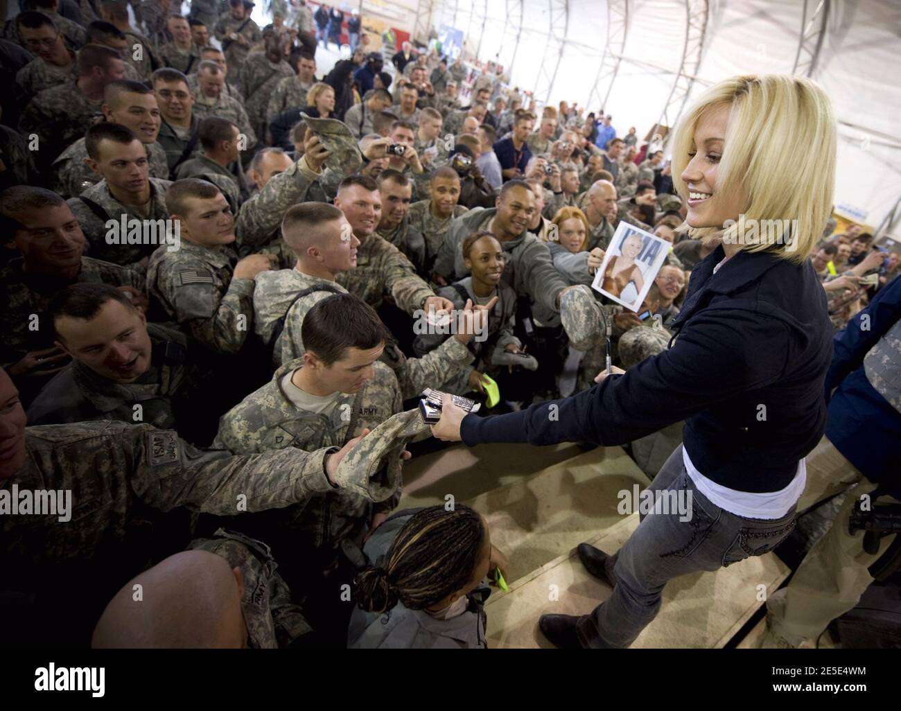 American Idol contestant Kellie Pickler signs autographs for soldiers after performing at Bagram Air Base in Kandahar, Afghanistan on December 17, 2008, during the 2008 USO Holiday Tour. Photo by Chad J. McNeeley/DOD/ABACAPRESS.COM Stock Photo
