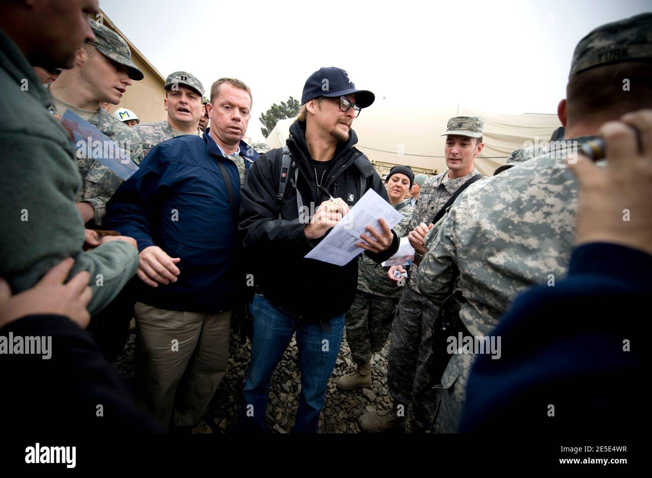 Kid Rock signs autographs after performing at Bagram Air Base in Kandahar, Afghanistan on December 17, 2008, during the 2008 USO Holiday Tour. Photo by Chad J. McNeeley/DOD/ABACAPRESS.COM Stock Photo