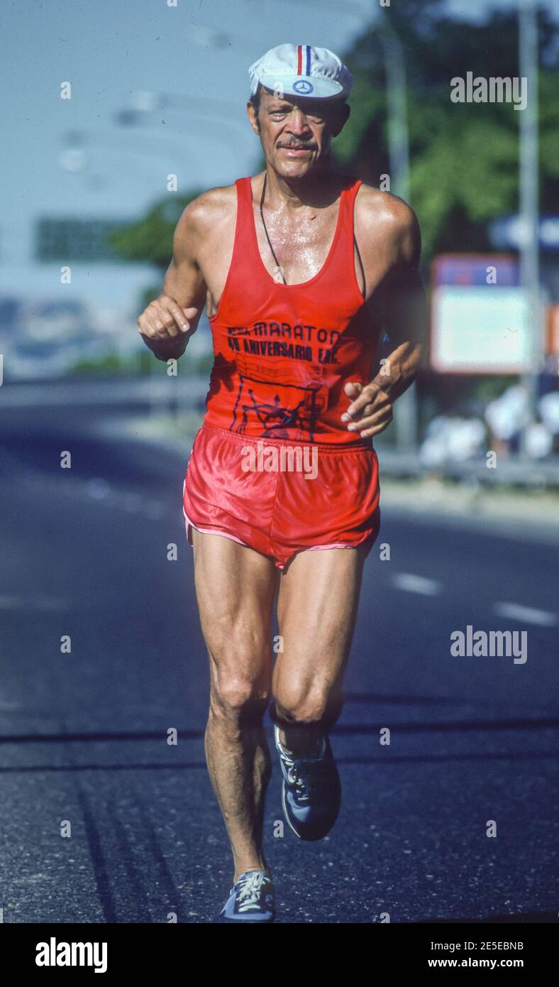 CARACAS, VENEZUELA, 1988 - Man wearing running gear training on Avenida Boyaca roadway, at El Avila. Stock Photo
