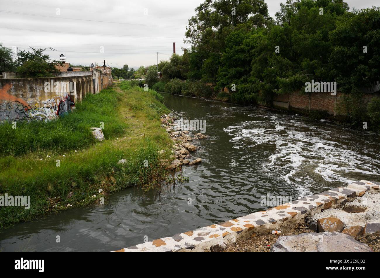 Polluted water of the Santiago river in el Salto, Jalisco Stock Photo