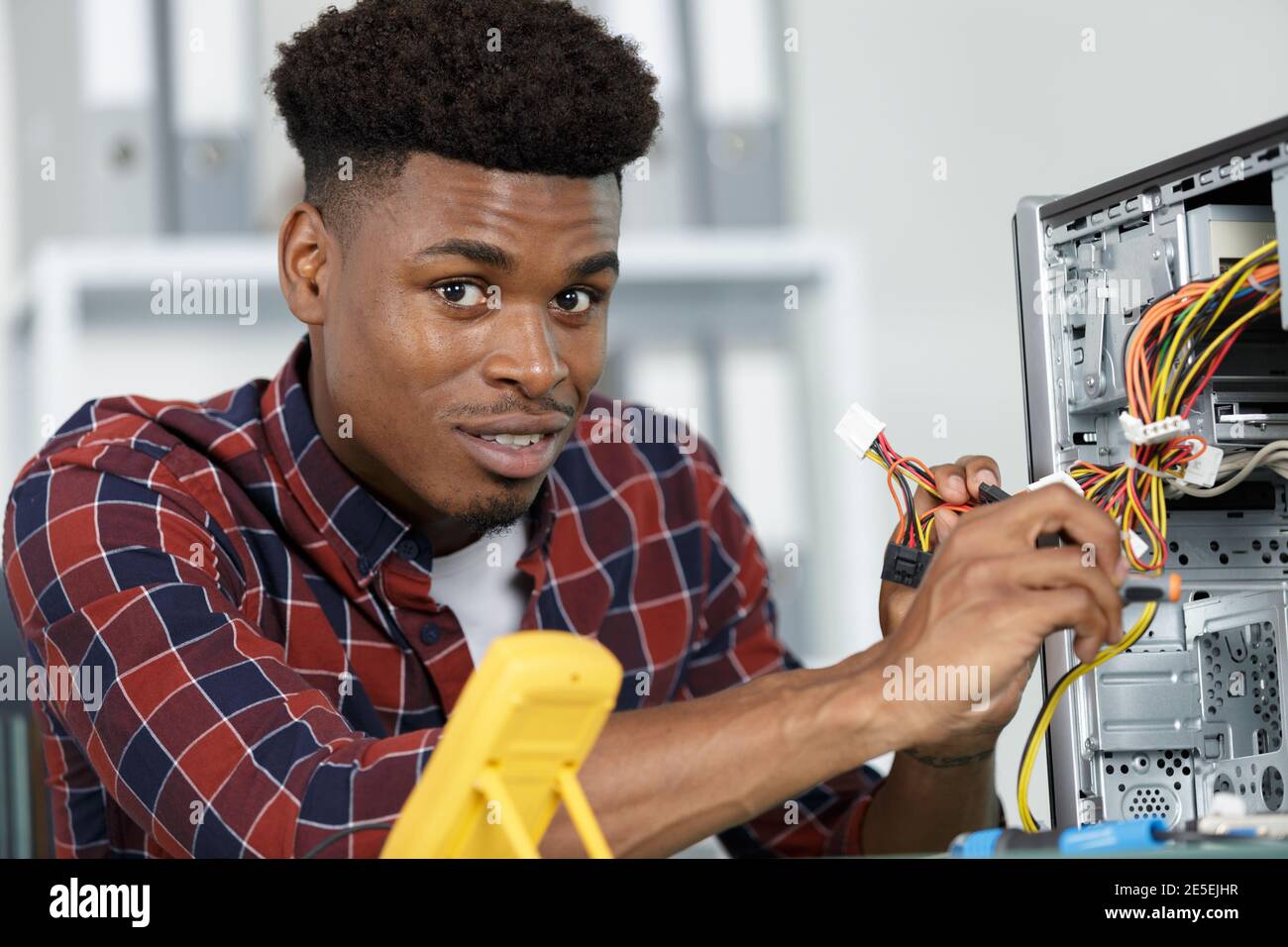 pc engineer connects cables Stock Photo - Alamy