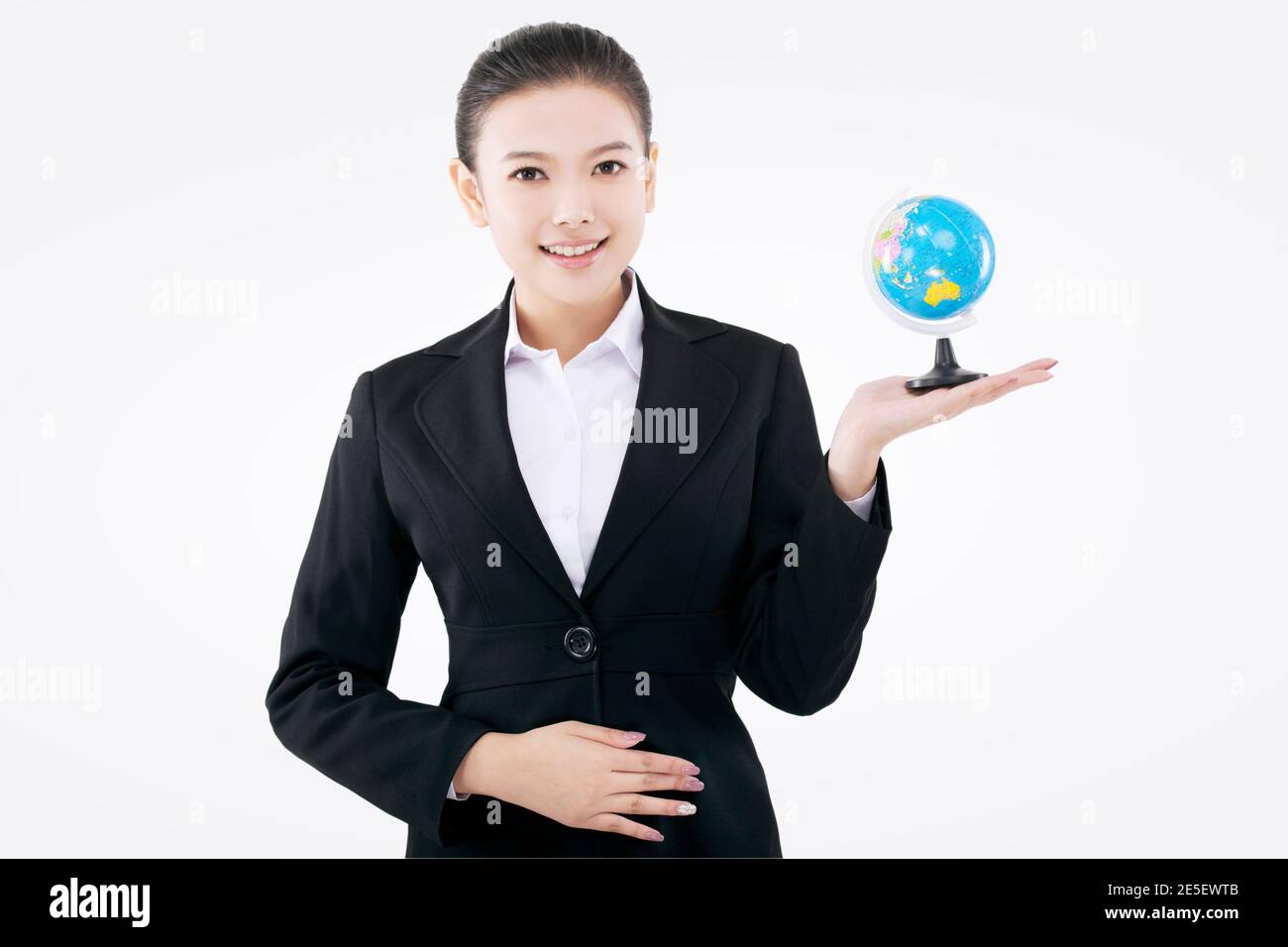 Black white hands holding globe hi-res stock photography and images - Alamy