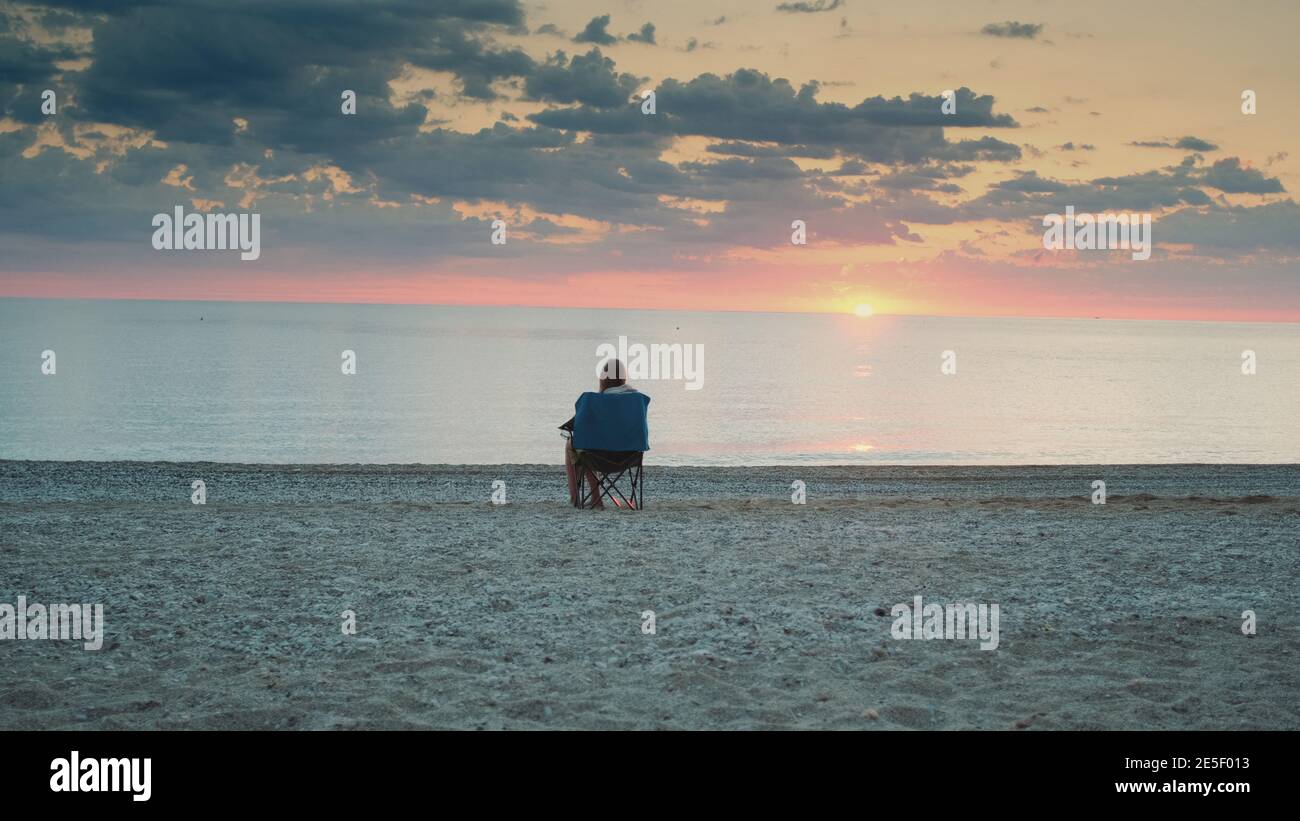 Full shot woman admiring sunset hi-res stock photography and images - Alamy