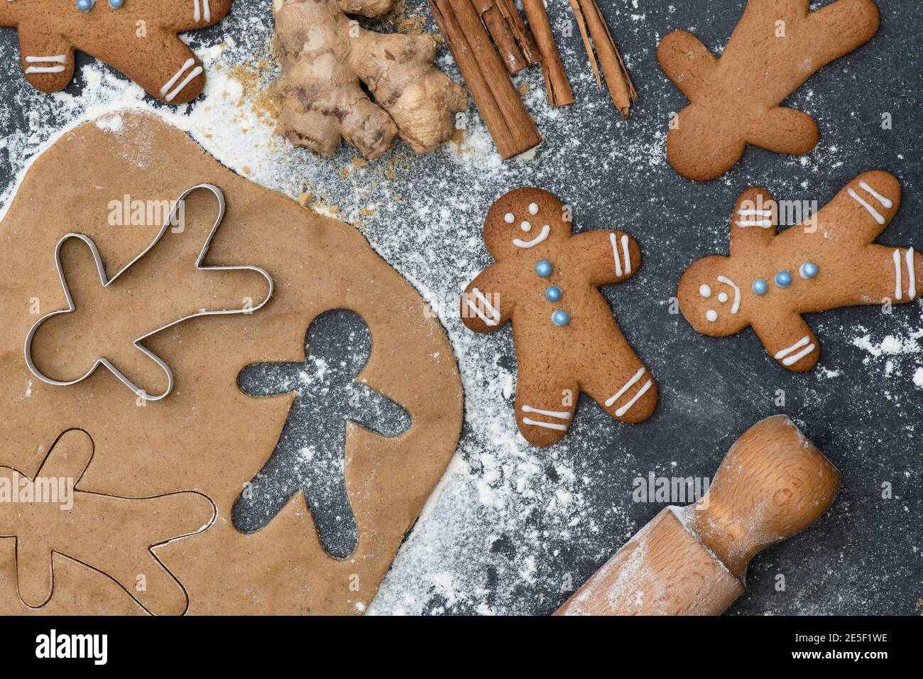 Gingerbread Men and biscuit dough Stock Photo