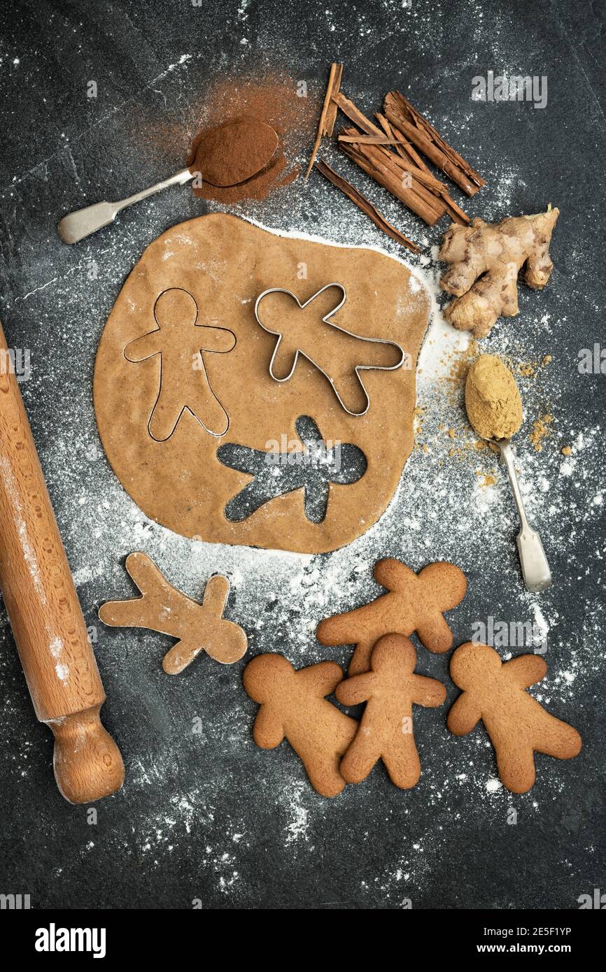 Gingerbread Men and biscuit dough Stock Photo