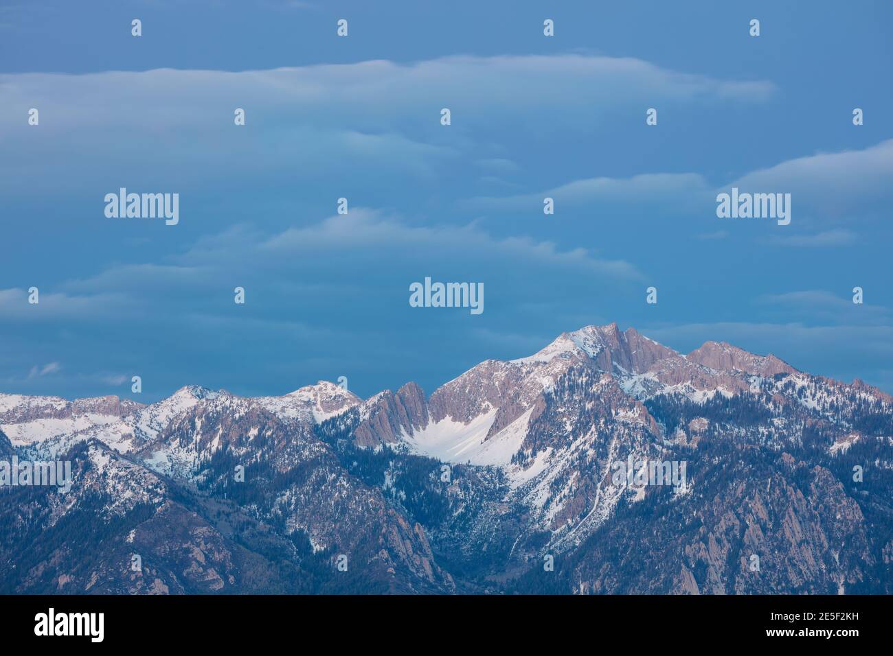 Snow capped Wasatch Mountains at dusk, Salt Lake County, Utah Stock Photo
