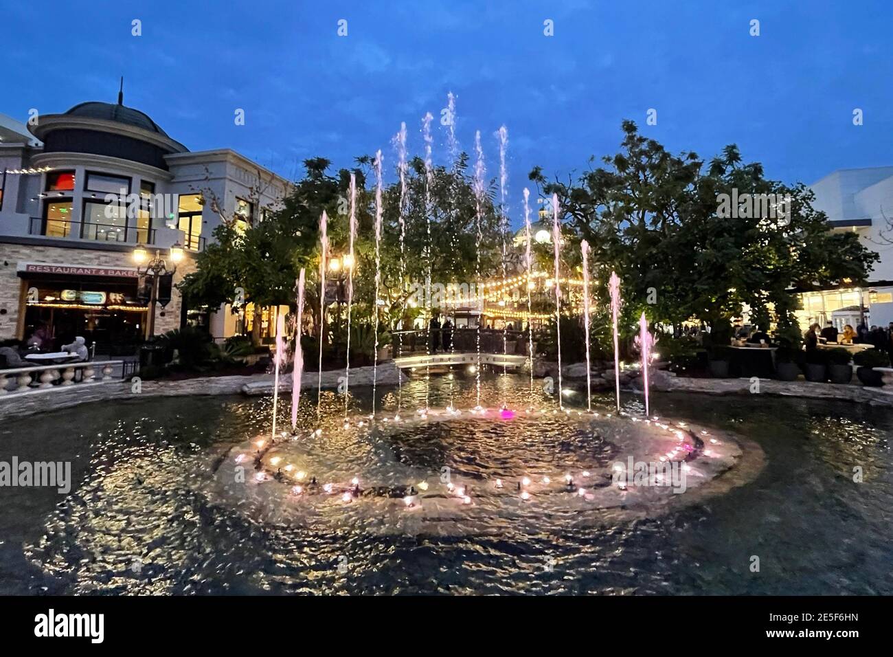 A water fountain and pond at The Grove shopping center, Wednesday, Jan