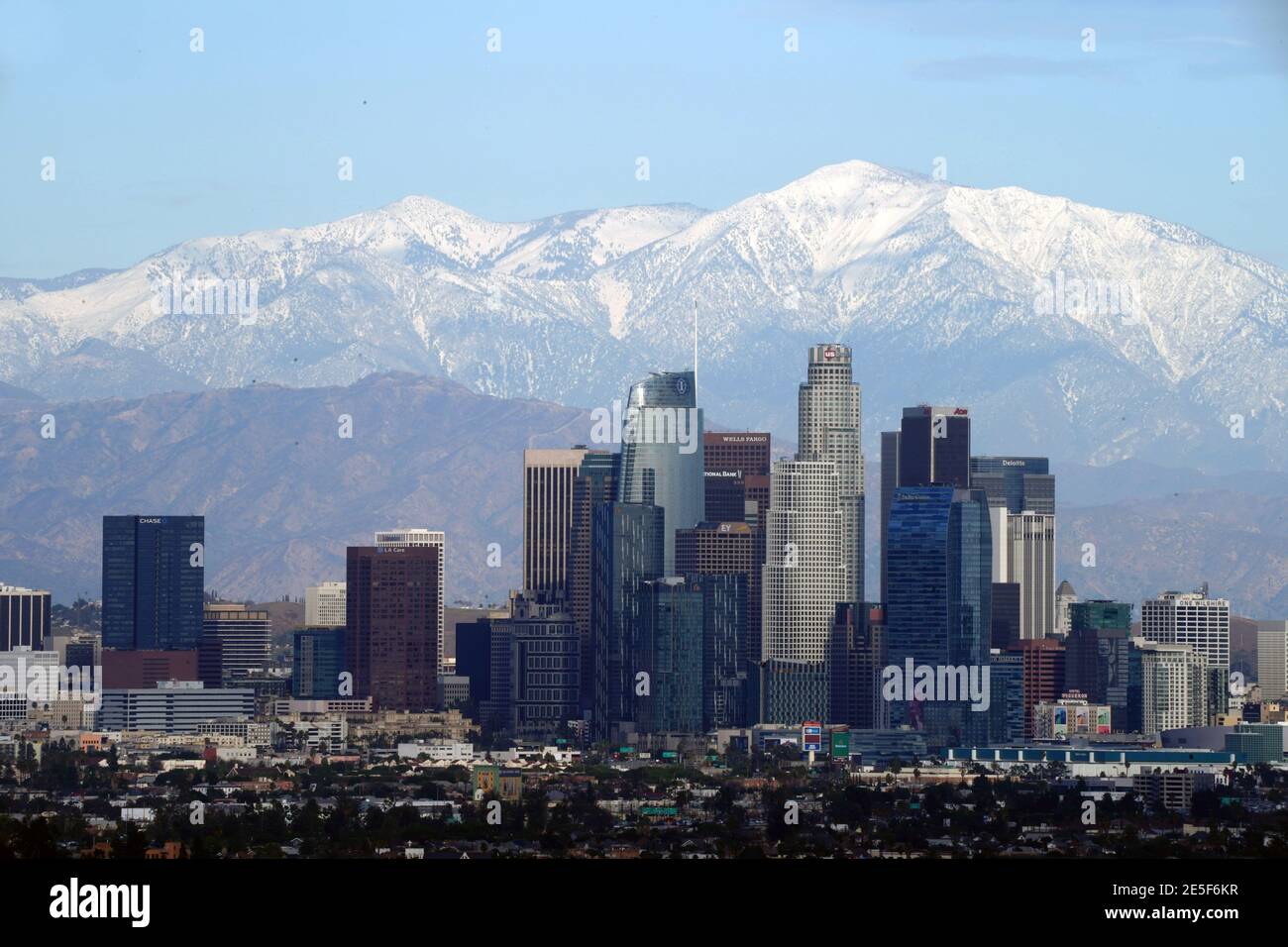 A general view of the downtown Los Angeles skyline with the snow-capped San Gabriel Mountains as a backdrop on Wednesday, Jan. 27, 2021. Stock Photo