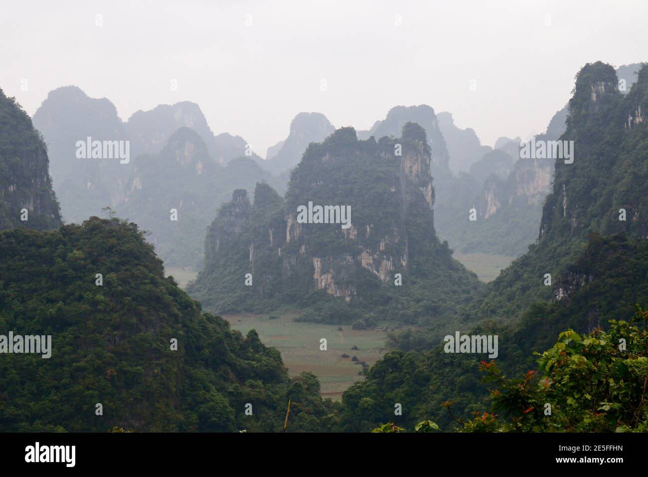 Karst landscape and mist, Longchuan County, Guangxi Province, China 23rd April 2016 Stock Photo