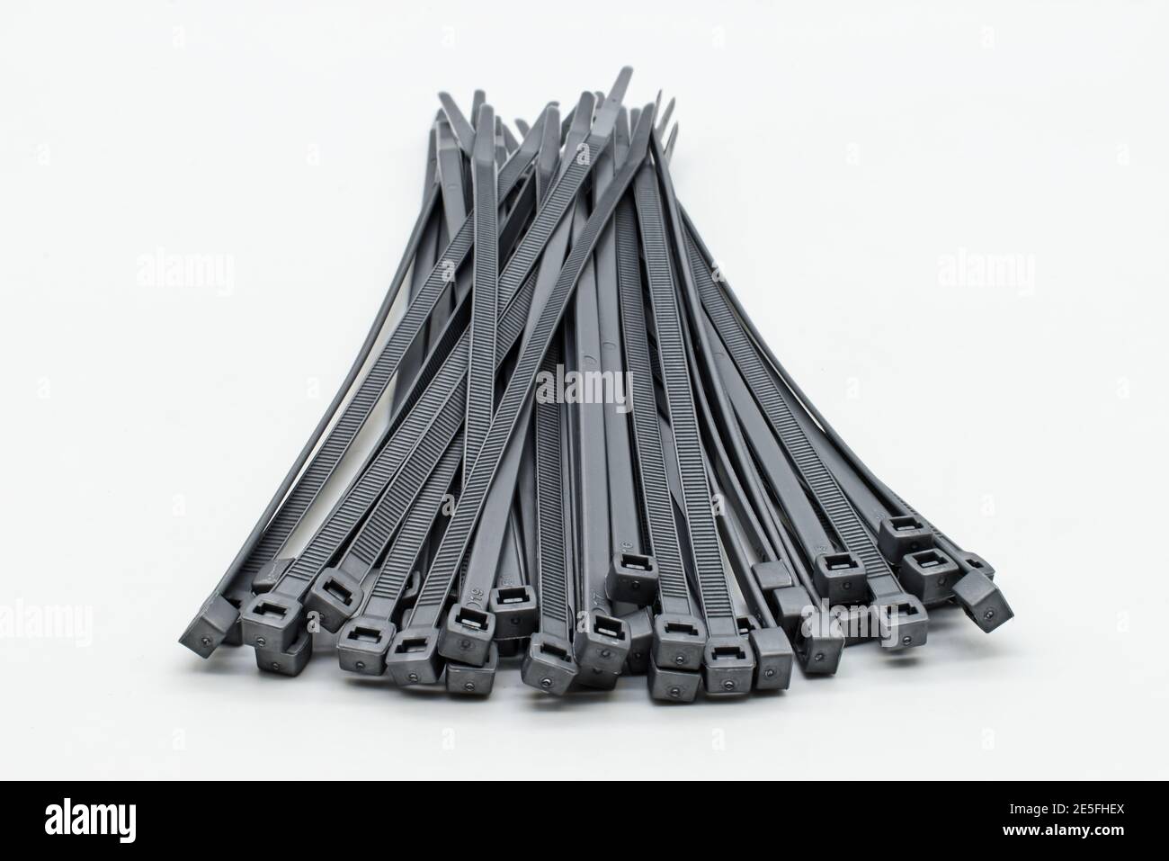 Plastic cable ties isolated on a white background Stock Photo