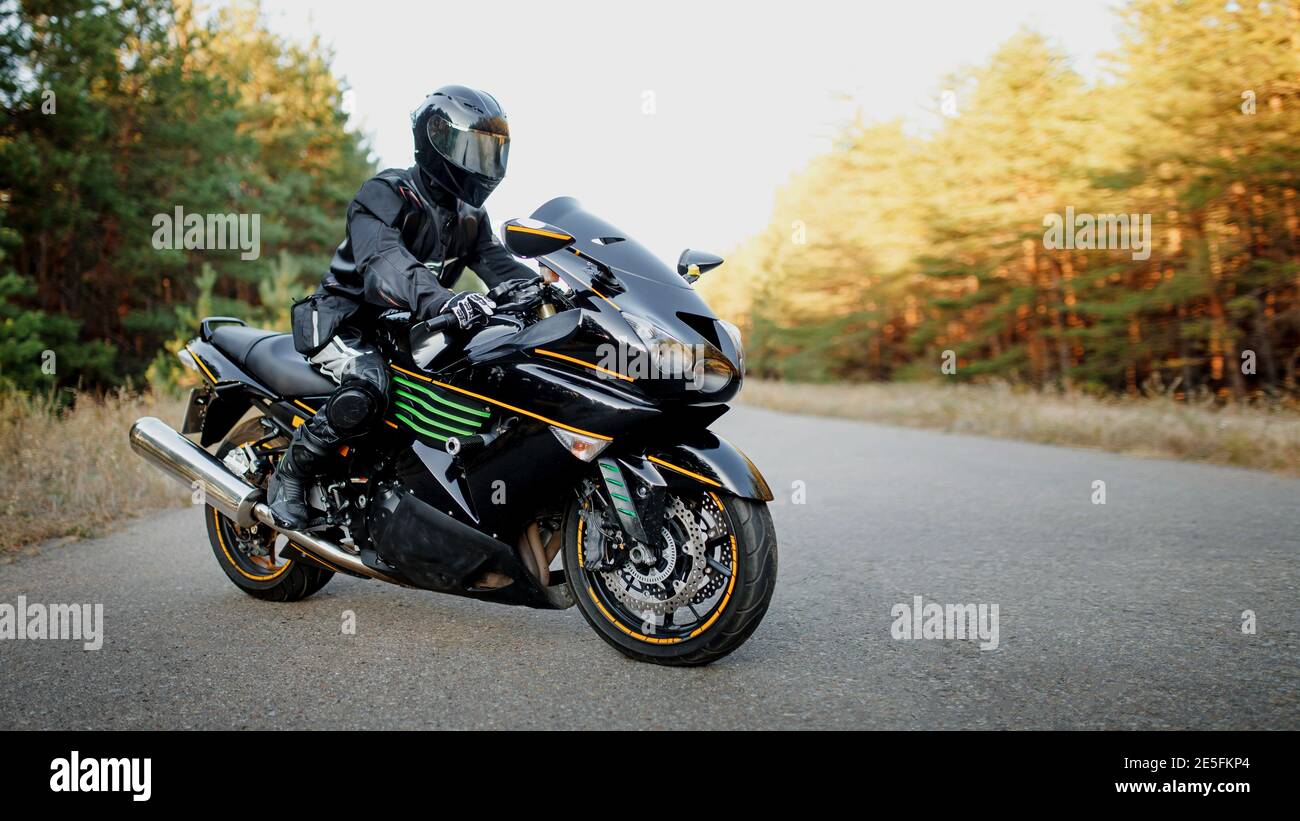 Cycle Rider Helmet Rider wearing a helmet hi-res stock photography and images - Alamy