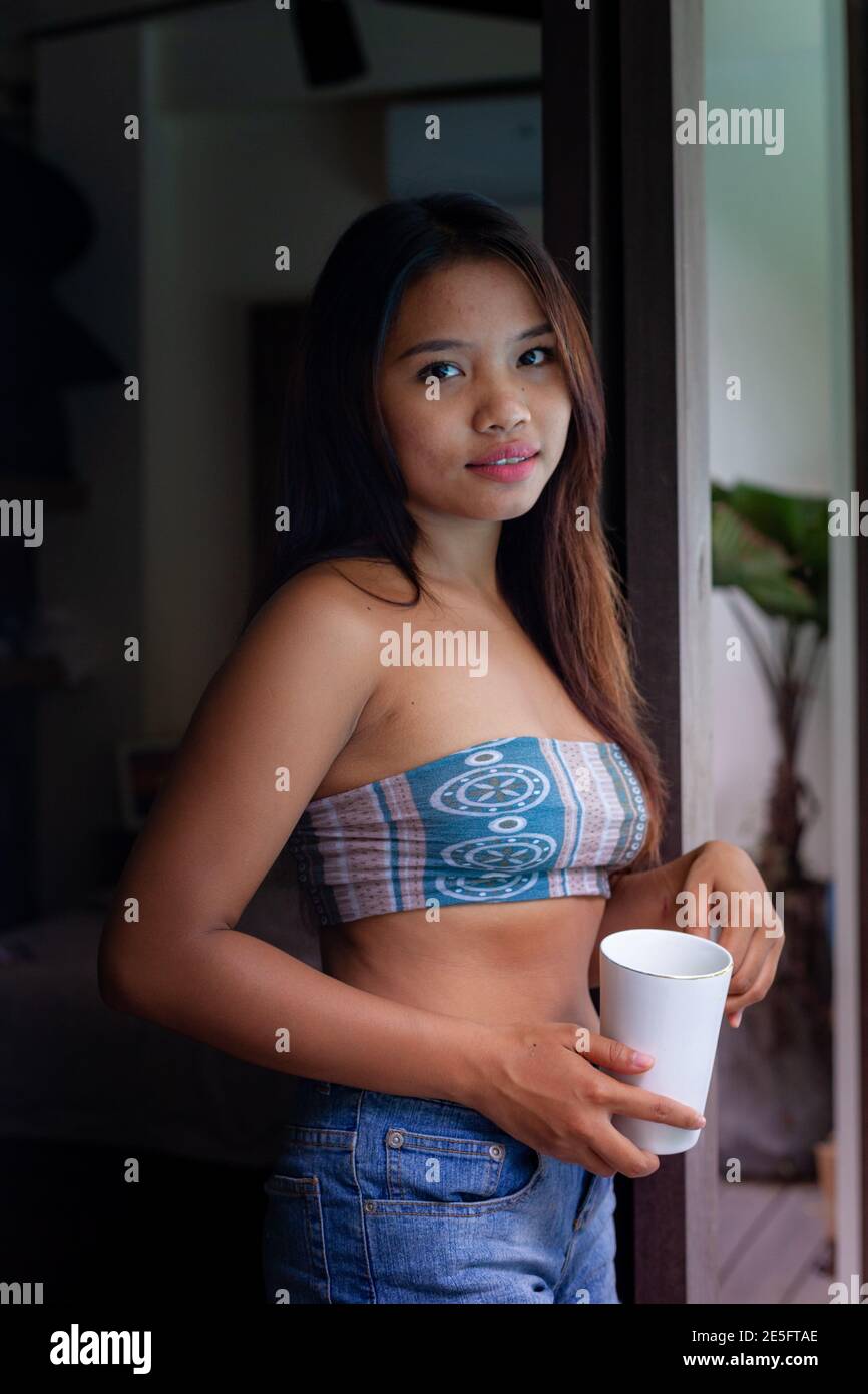Asian Young and Cute Girl woman Happy Having a Morning Fragrant Coffee at  Home, Villa or Resort Stock Photo - Alamy