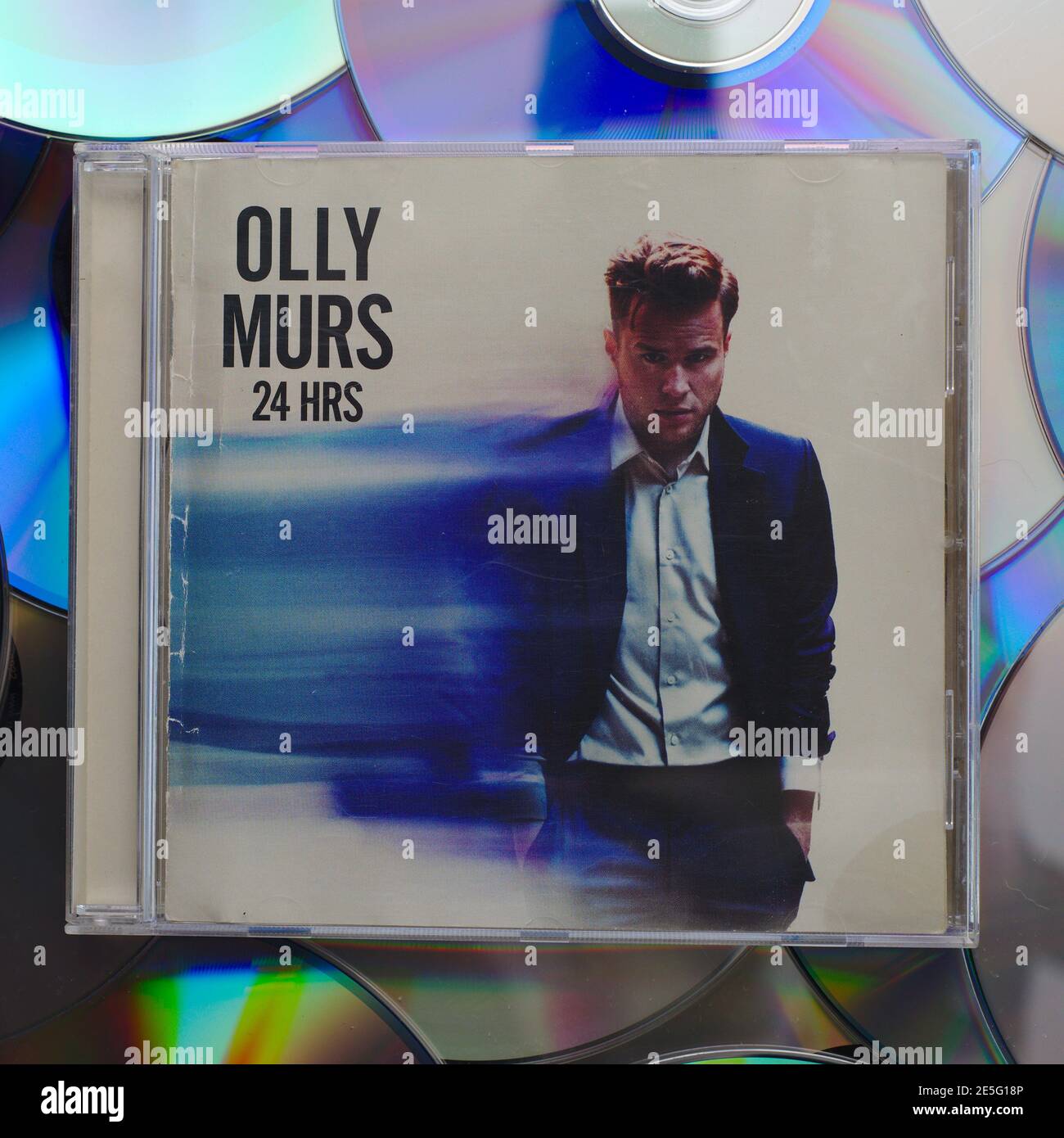 A copy of the Olly Murs album 24 Hrs on CD Stock Photo - Alamy
