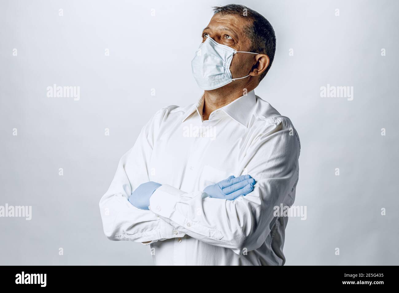 Old man wearing protective mask and gloves Stock Photo - Alamy