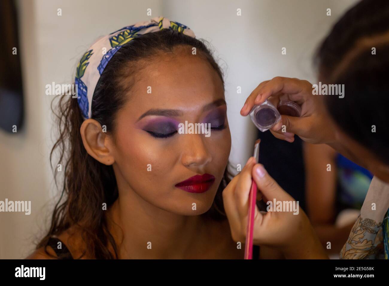 Makeup Artist Young Asian Pretty Doing Makeup to an Asian Latina Model Stock Photo