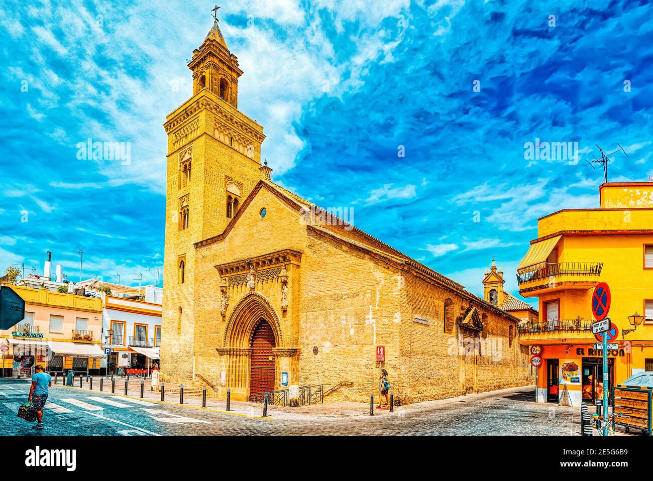 Seville, Spain - June 08,2017: Iglesia de San Marcos (Church of San Marcos) on St. Mark's Square (Plaza San Marcos) in downtown of the city Seville. S Stock Photo