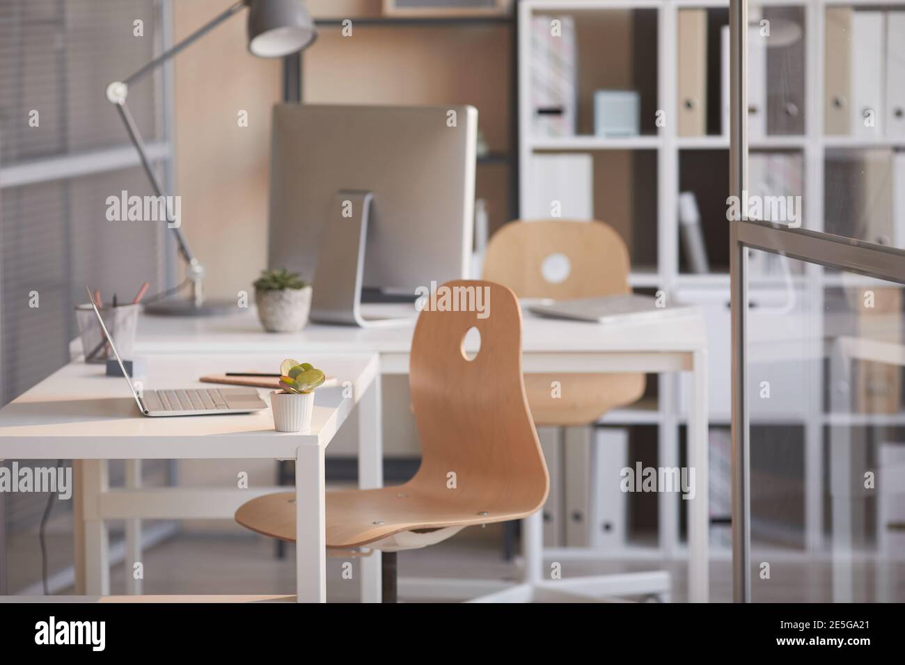 Image of modern office interior with desk and computer at empty office ...