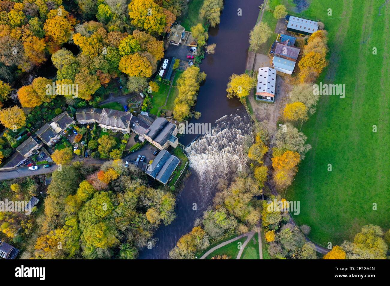 Aerial photo taken in the town of Shipley in Bradford West Yorkshire showing the Leeds & Liverpool canal taken in the Autumn time with brown leafs on Stock Photo