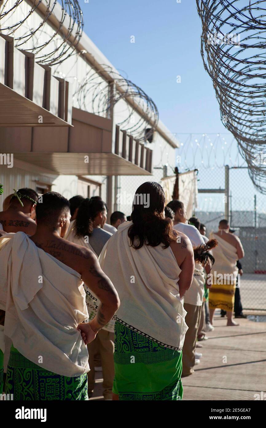 Inmates celebrate the Makahiki festival, the ancient Hawaiian New Year, at the Sahuaro Correctional Center in Eloy, Arizona November 9, 2011. Two spiritual leaders from Hawaii visited the prison to teach and enlighten Hawaiian inmates of their culture. The facility in Arizona currently houses prisoners from Hawaii. REUTERS/Samantha Sais (UNITED STATES - Tags: CRIME LAW SOCIETY) Stock Photo